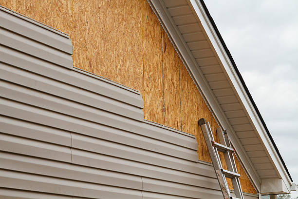 Professional Siding Installation technician working in Buies Creek, NC